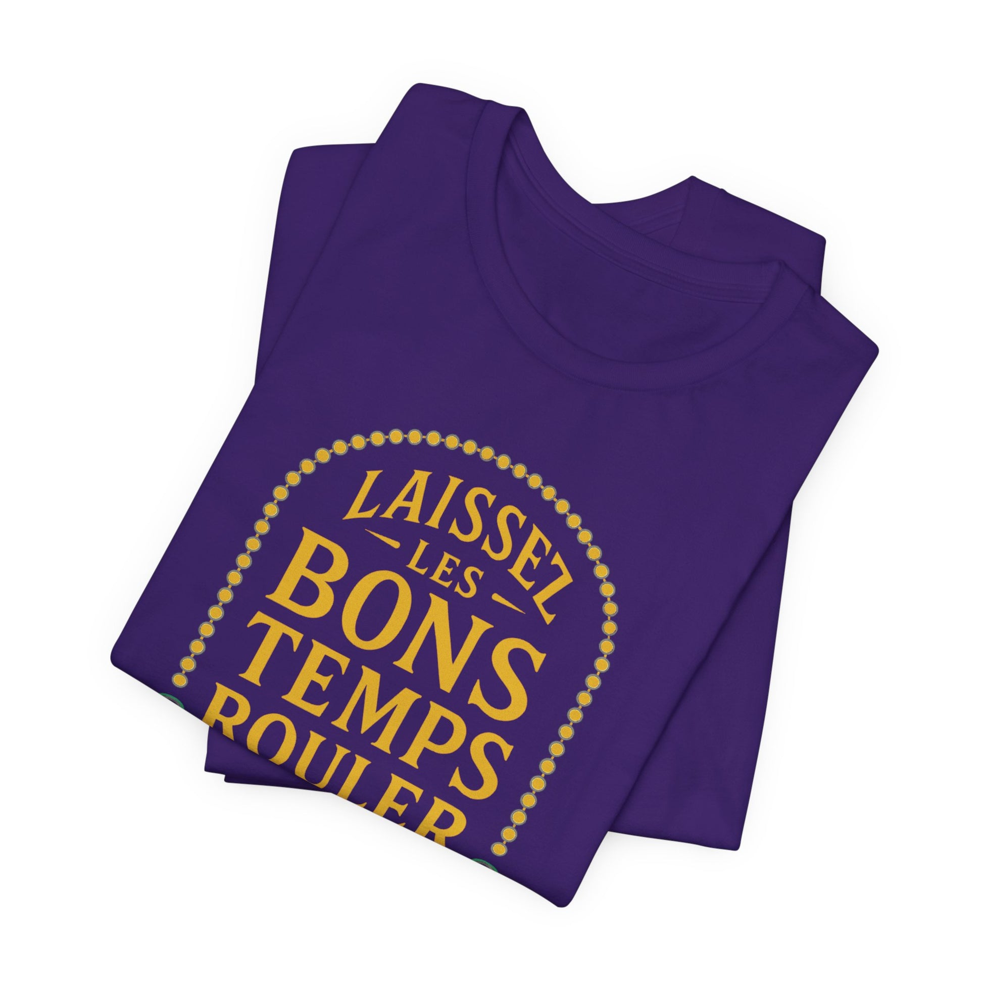 Purple t-shirt with yellow text 'Laissez les bons temps rouler' on a white background, folded view